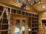 Rolling ladder bookcase.